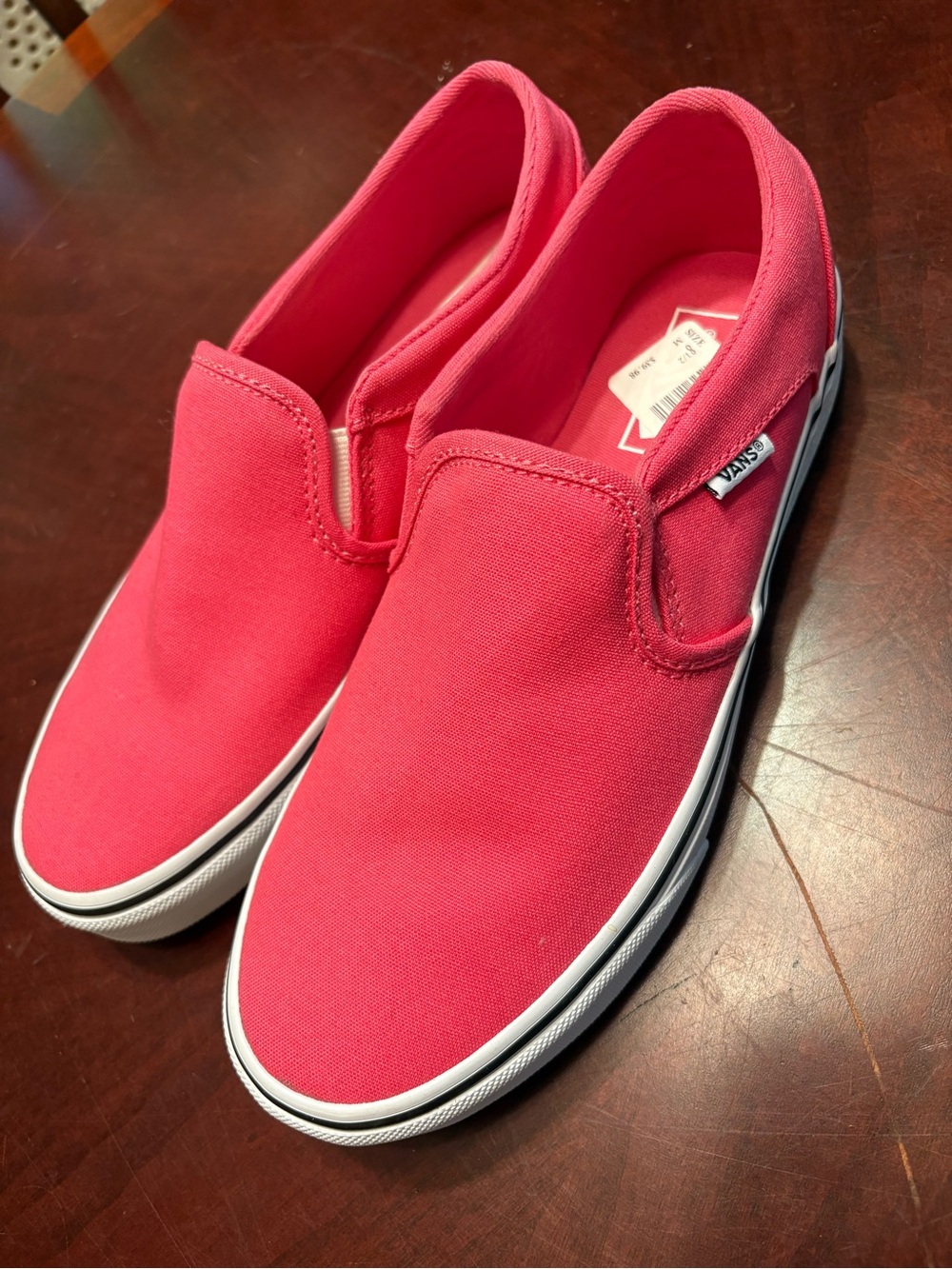 Vans Slip-On Canvas Sneakers in Bright Pink